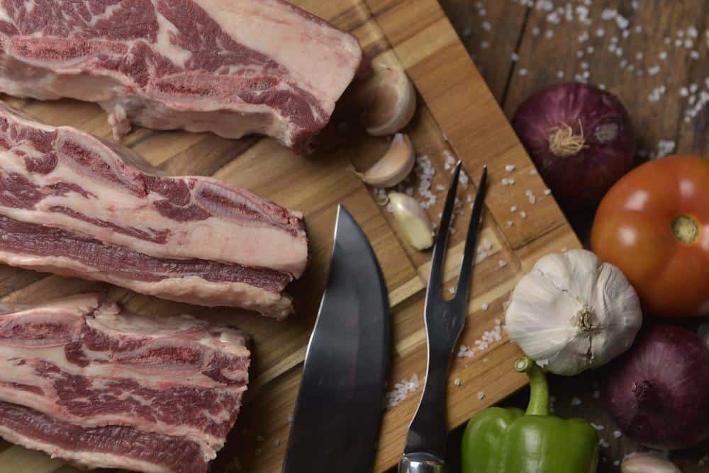 sliced raw meat chopping board
