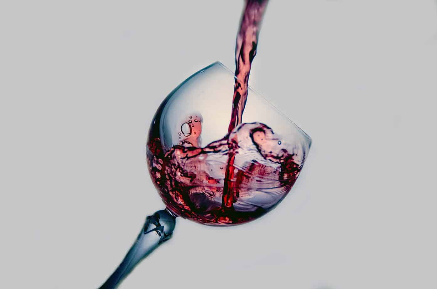 pour wine in a glass